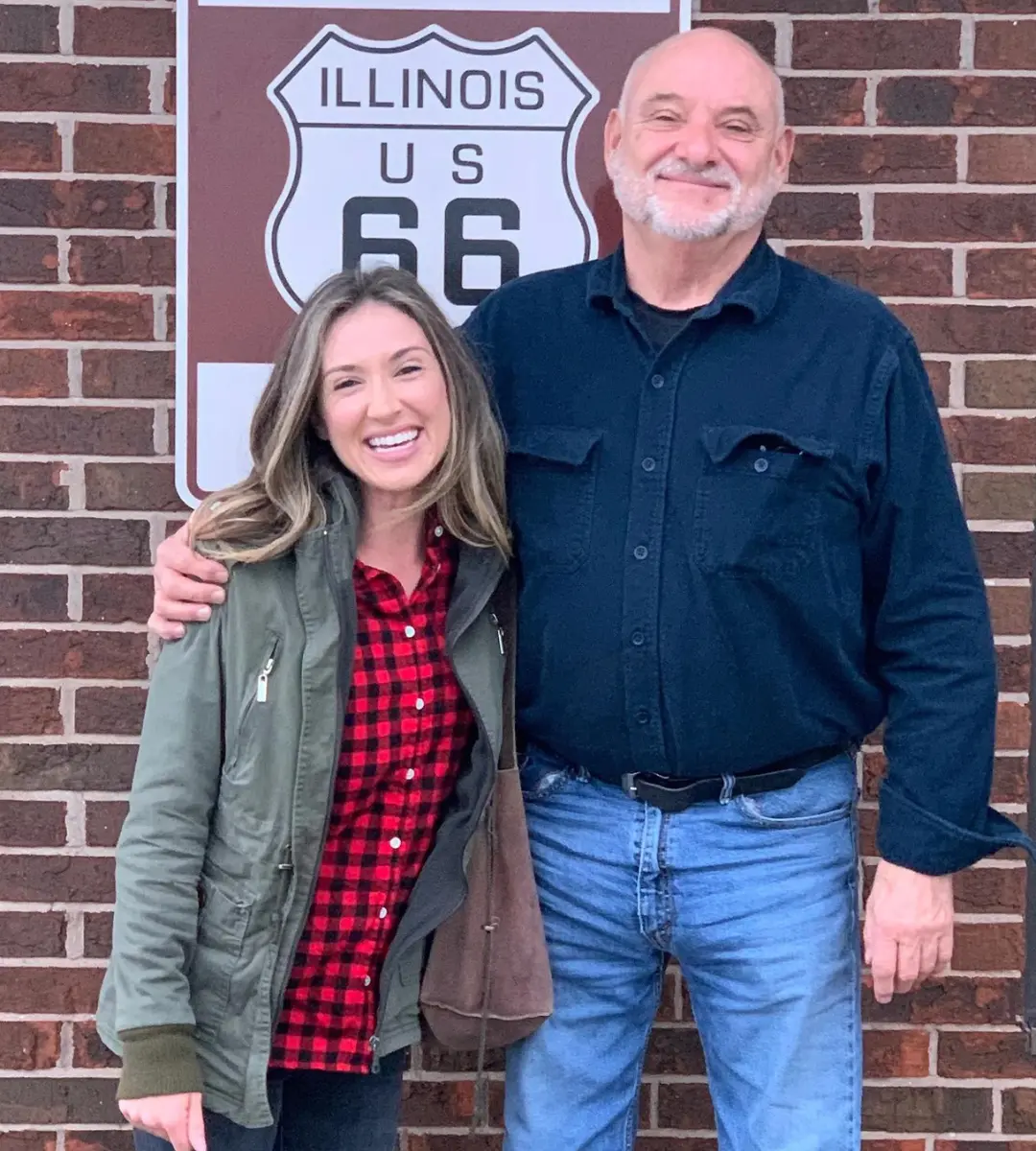 Founder Dani with her Dad, smiling at the camera