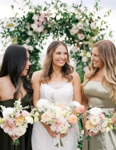 Bride and bridesmaids with florals done by Winters Farm